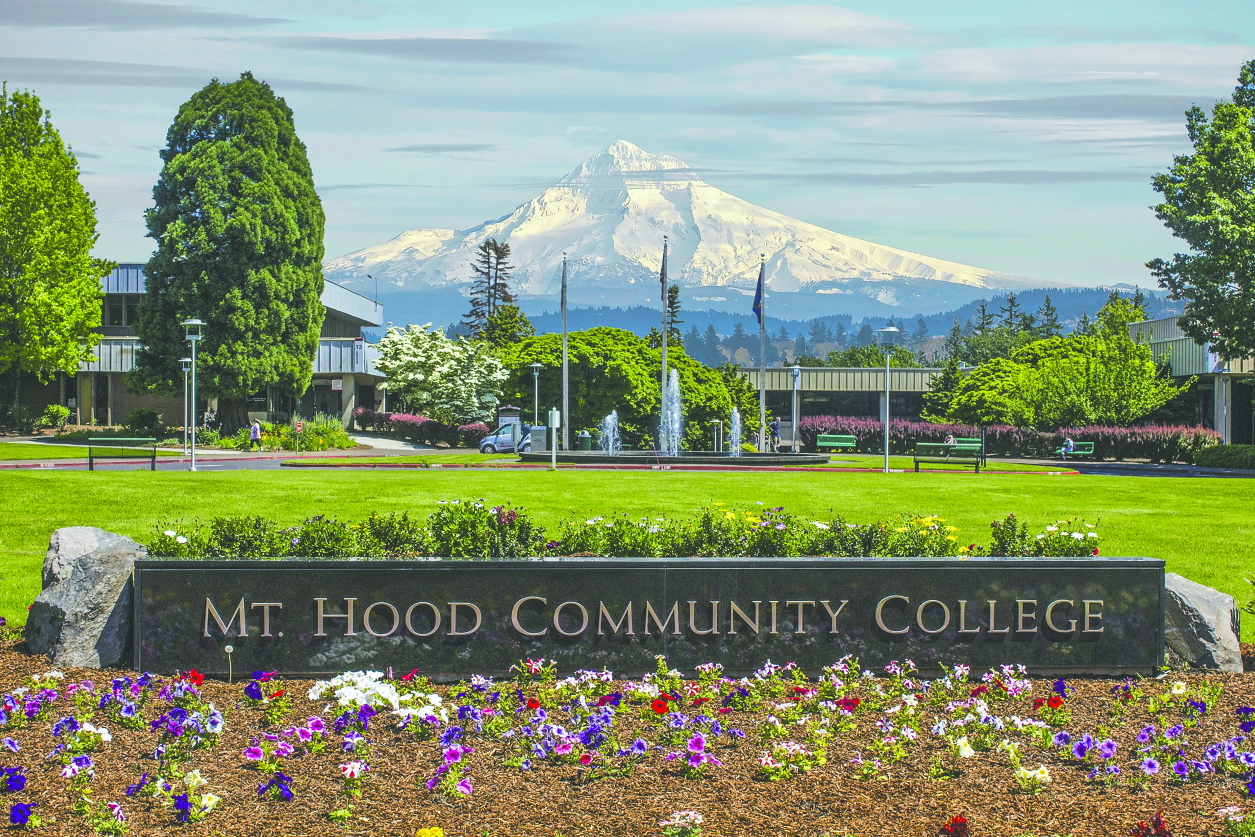 a photo of mount hood community college with mount hood in the background