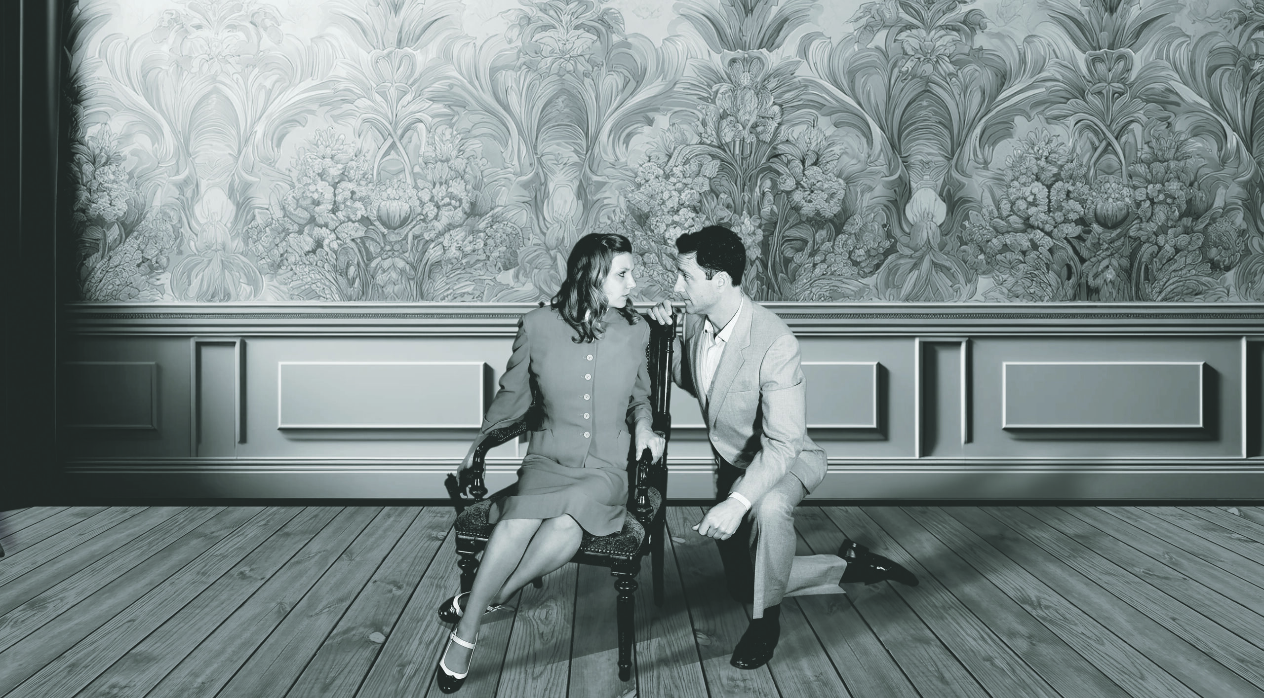 a black and white photo of actors from a scene in a play