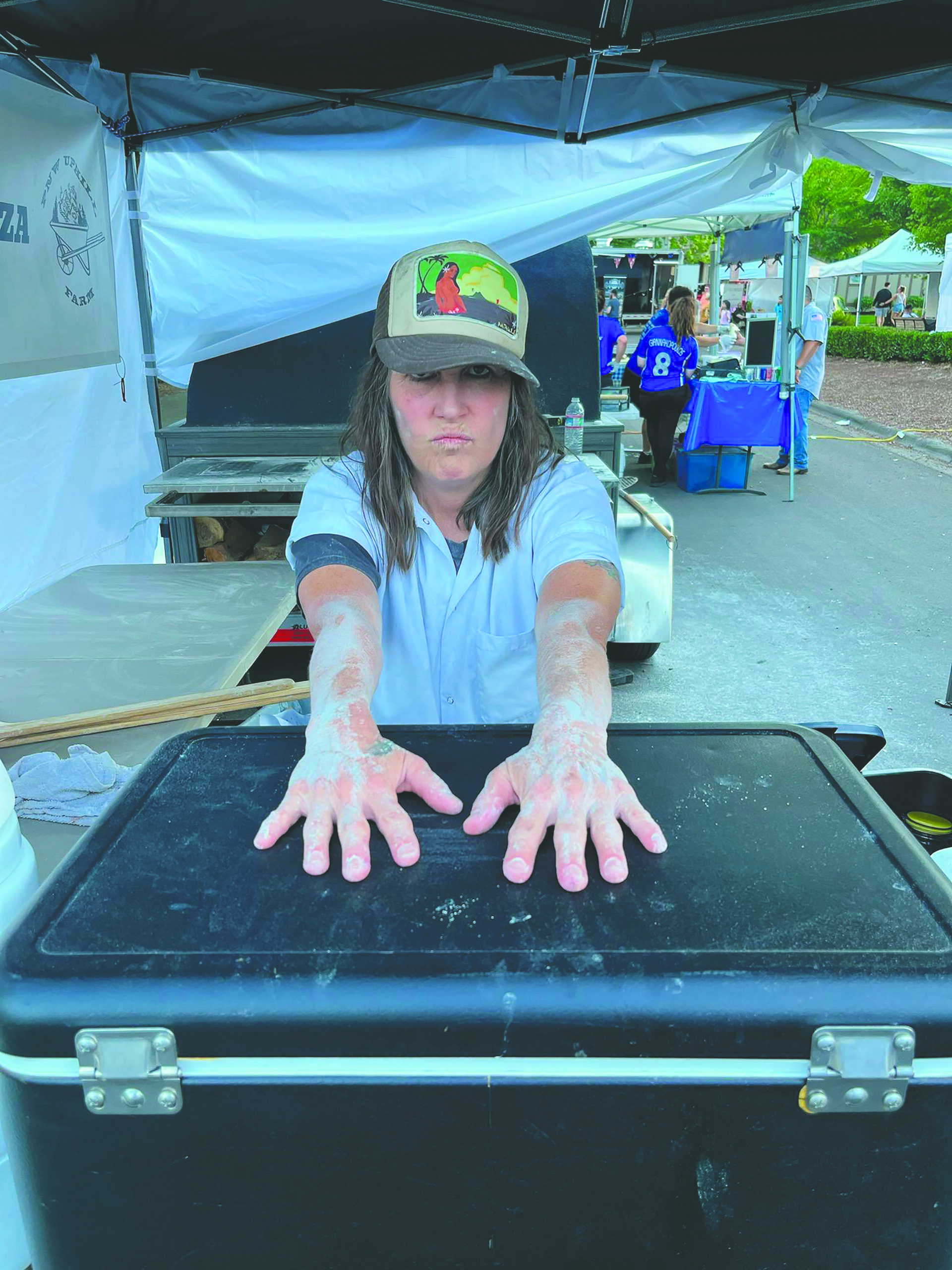 The Bakers shows her hands covered in flour