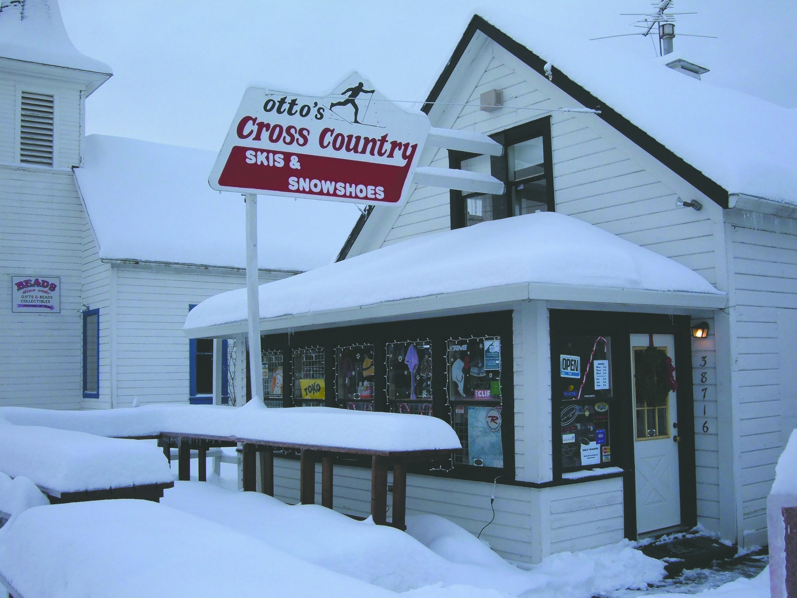 The Otto ski shop store front covered in snow