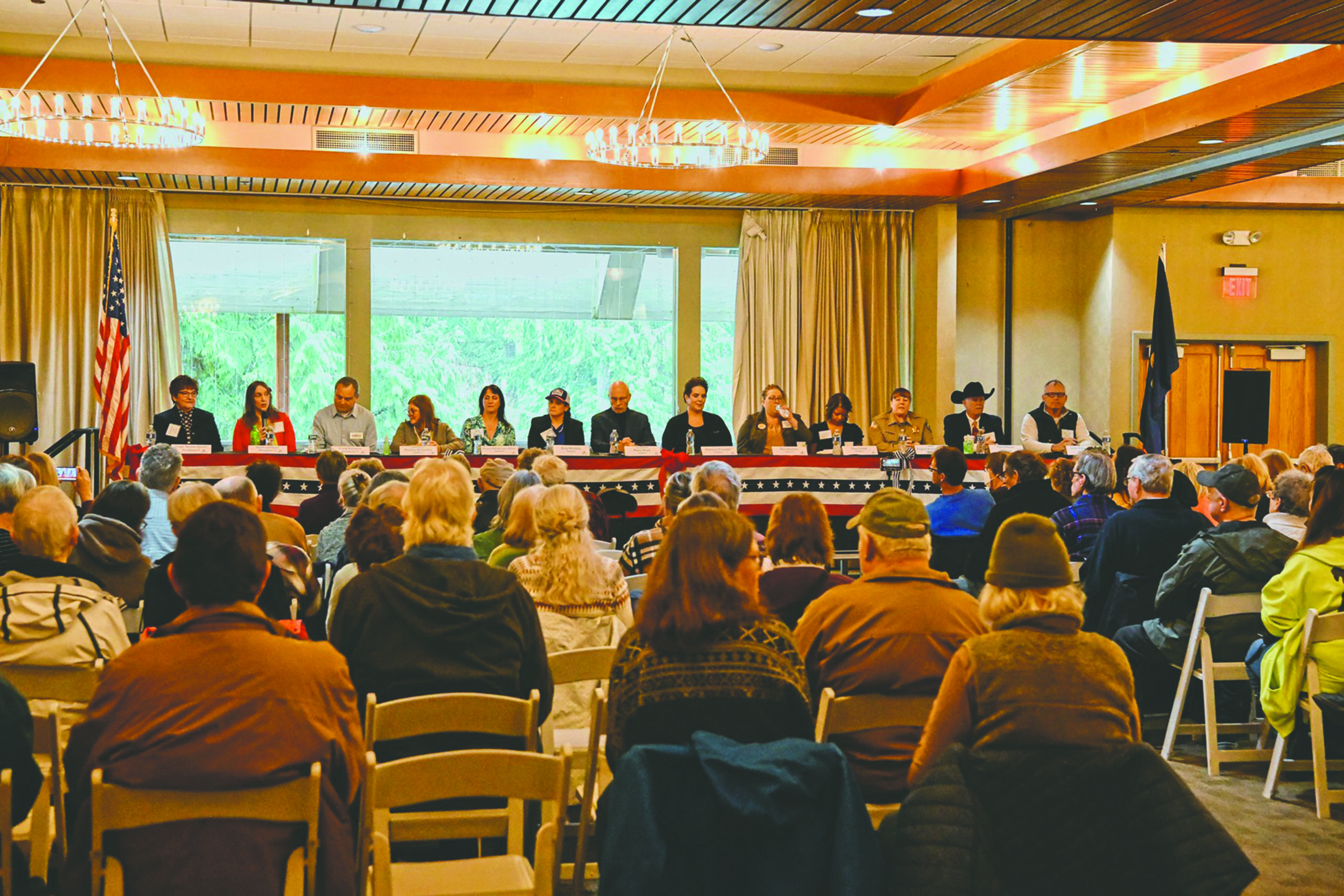 a meeting hall full of community members