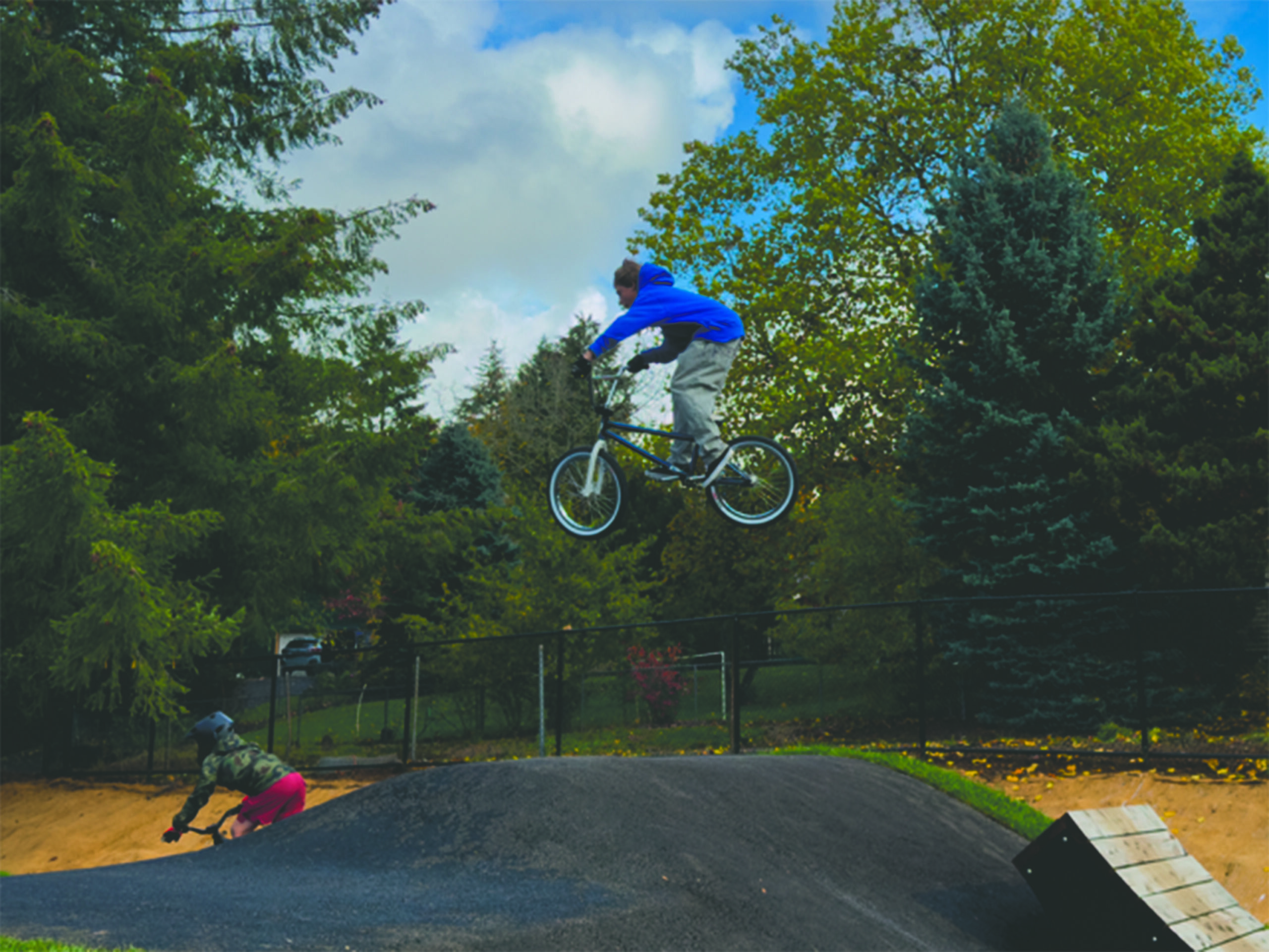 A biker at the height of a jump