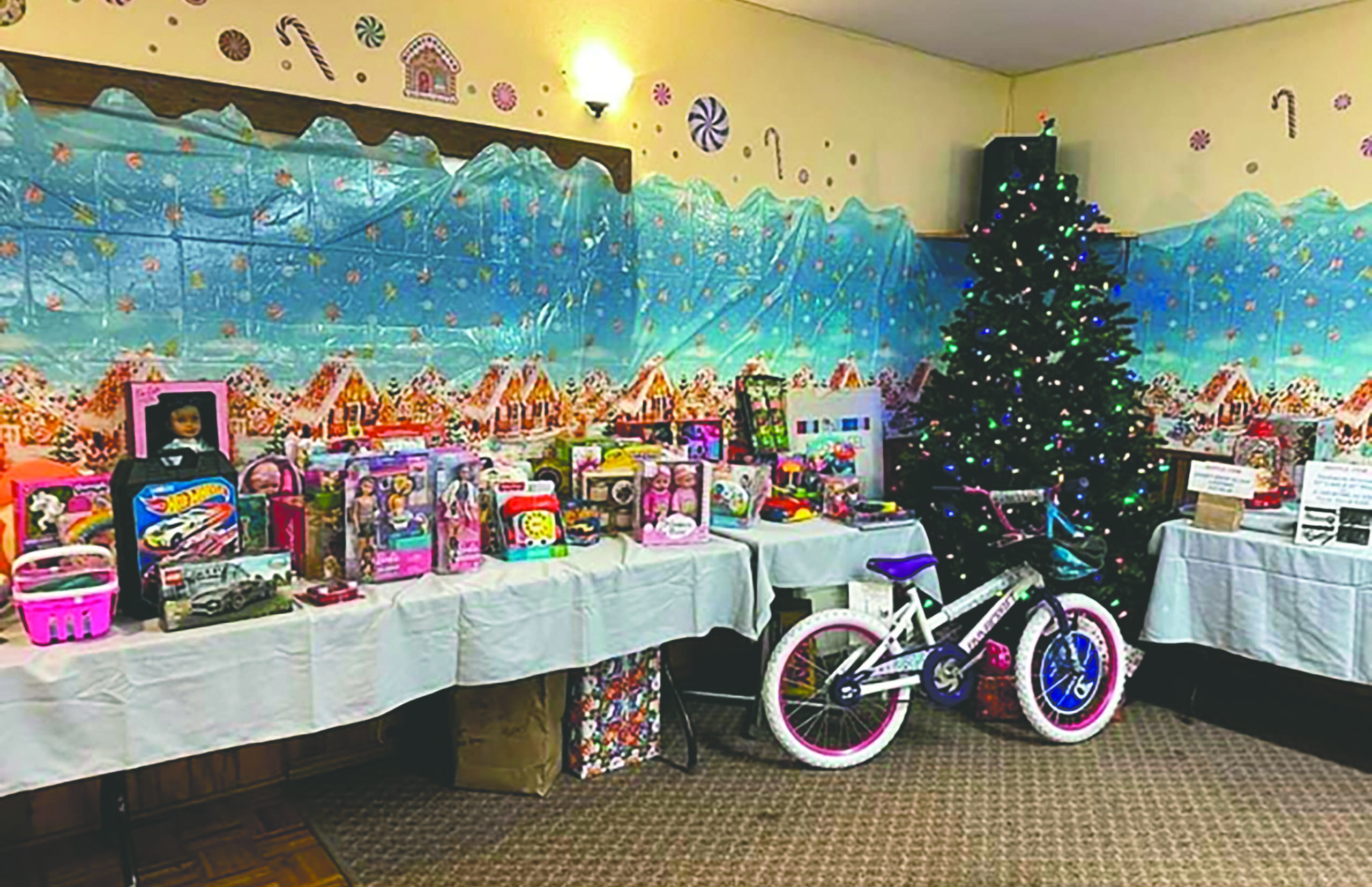 a table set up full of donated toys