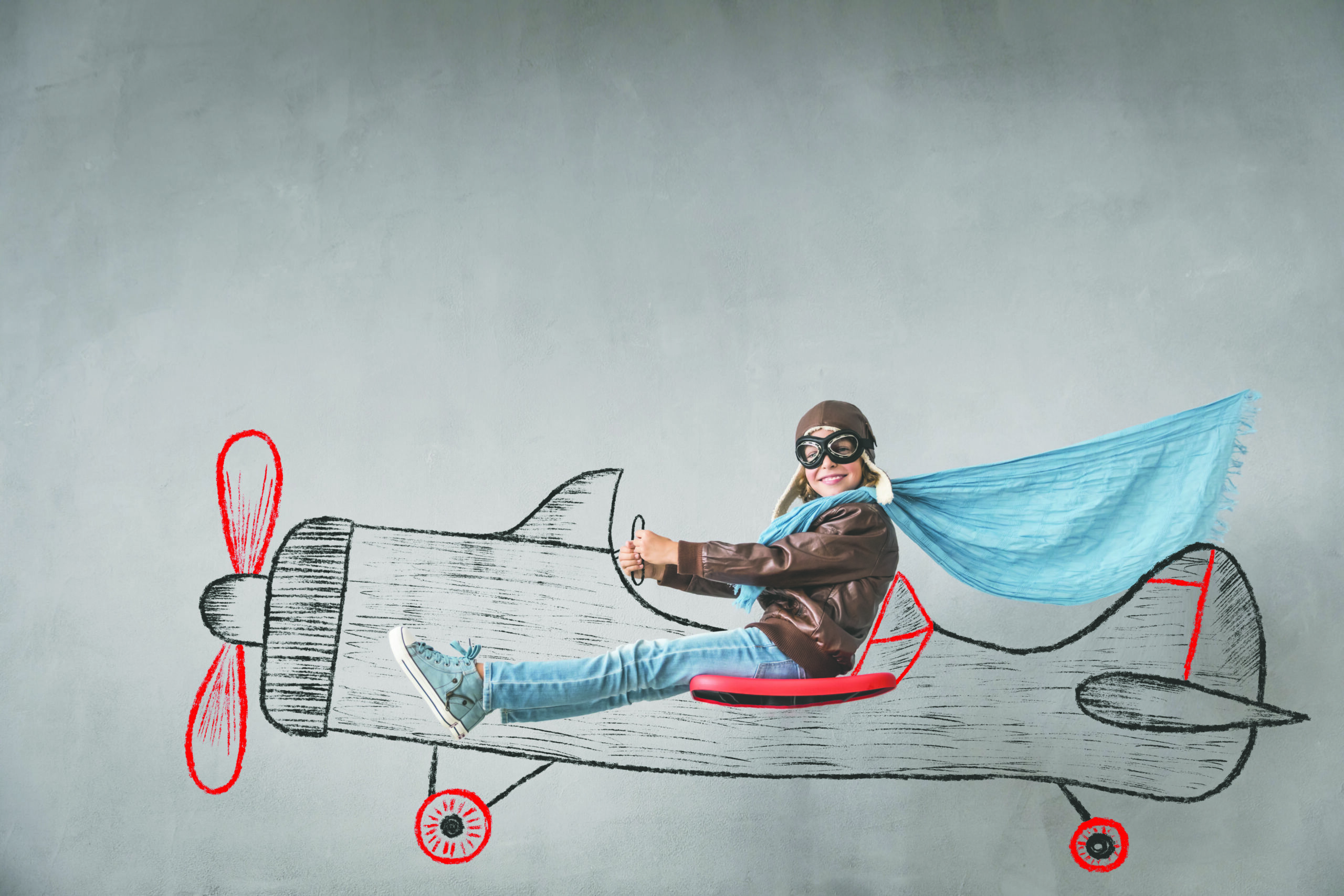 Happy child pilot travel by imaginary plane. Success, creative and idea concept
